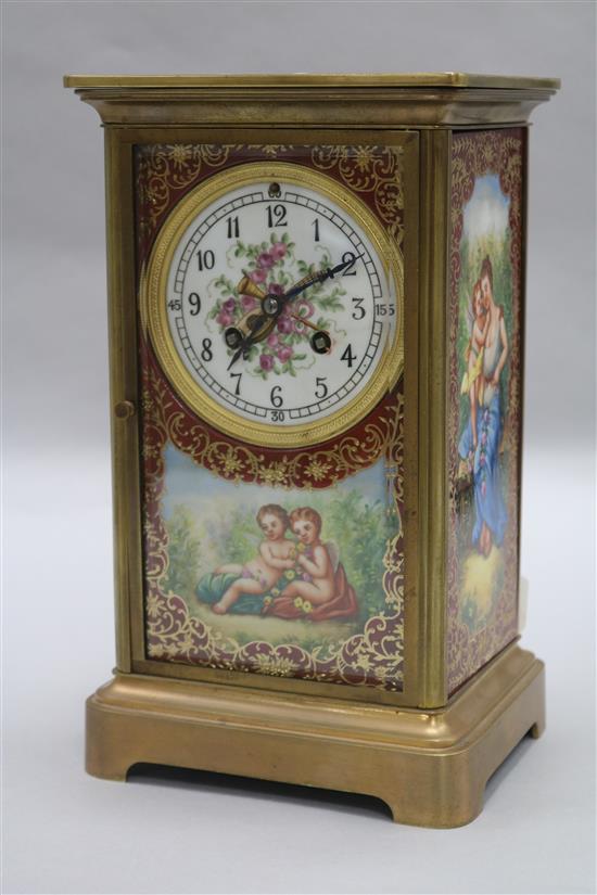 A porcelain four panel clock height 28cm